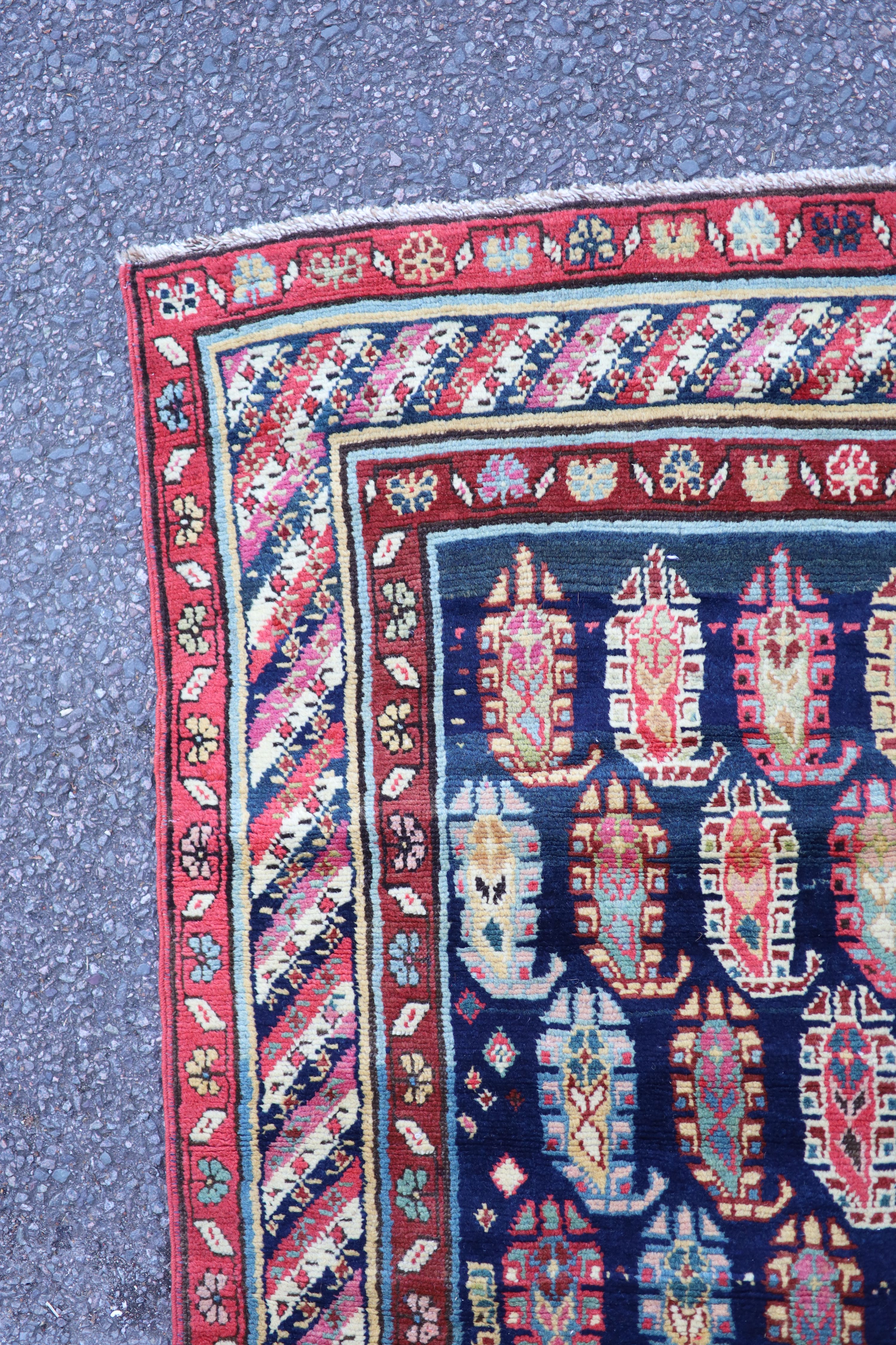 An antique Karabagh blue ground runner, late 19th century 355 x 106